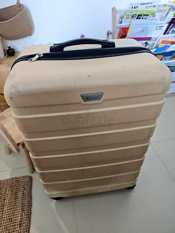 2 Beige travel luggage