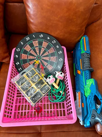 Free Kids toy bundle: dartboard, gun, jump rope & puzzles