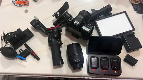 Nikon D7500 DSLR Camera + Nikon 18-140mm Lens + DJI RS 4 Gimbal Stabilizer + Saramonic Wireless Micr