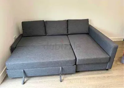 Gray L-shaped Sofa Bed with Storage - Good Condition