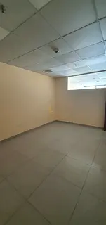 Office for rent in Al Mamzar, Sharjah, featuring a stunning lake view and free air conditioning