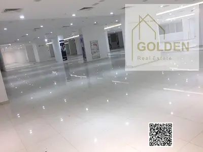 Commercial Building with Mezzanine for Rent on a Main Road in Ajman Industrial Area | Equipped with Offices, Air Conditioning, and Elevators