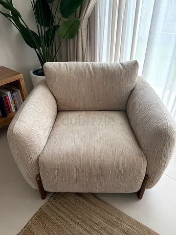 Comfortable Beige Upholstered Armchair with Wooden Legs - Excellent Condition