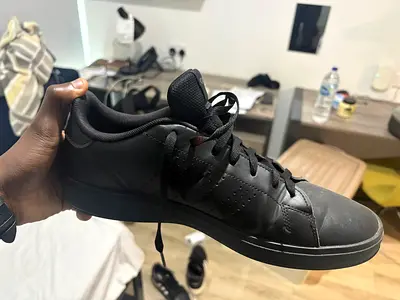 Black casual sneakers - lightly used, size unspecified