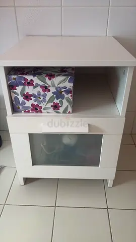 2 white bedside tables