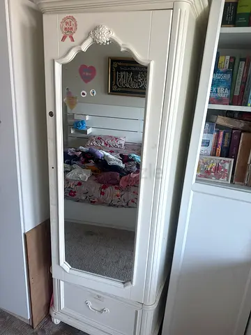 Beige freestanding wardrobe with full-length mirror