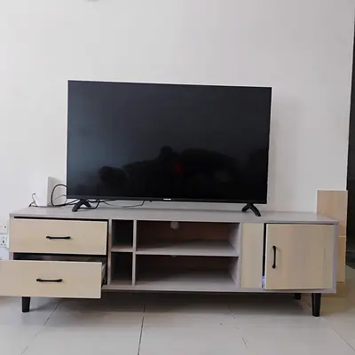 55 inch Smart LED TV with TV Cabinet in Good Working Condition