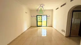 One of the most attractive 2-bedroom apartments with a living room in Al Taawun, featuring a spaciou