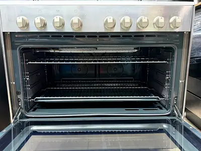 Stainless Steel Gas Range with Large Oven — Good Working Condition