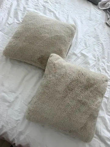 Pair of soft beige faux fur throw cushions - 45x45cm & 30x30cm