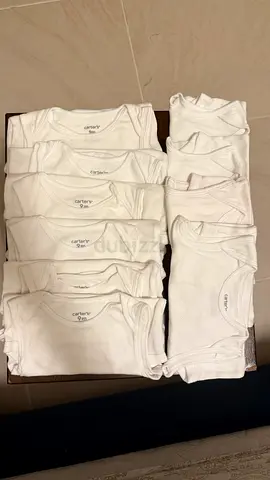 Carter’s 10 pieces tank top white, size 6-9. Bundle price 15 dhs