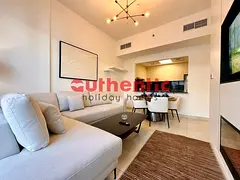 Sleek Furnished | Bright Unit | Airy Living Room