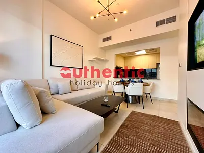 Sleek Furnished | Bright Unit | Airy Living Room