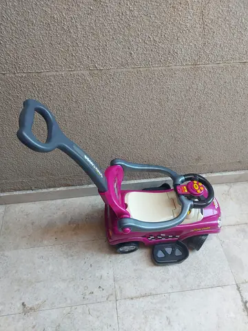 Used Pink Ride-On Push Car with Parental Handle and Footrest