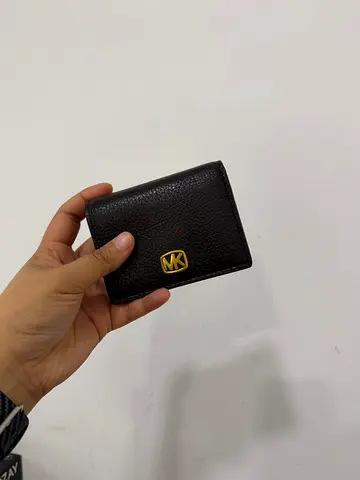 MK Small Bryant Compact Wallet in Pebbled Leather