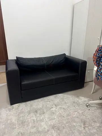 Ikea Askeby Black leather 2-seater sofa in good condition