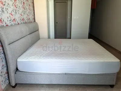 Hydraulic Storage King fabric bed frame with mattress - light grey, good condition