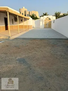House for rent in Al-Khuzamiya 3 bedrooms Including 2 master rooms Large hallway Living room Kitchen