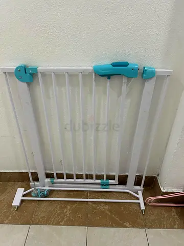 White pressure-mounted baby safety gate (removable, extendable)