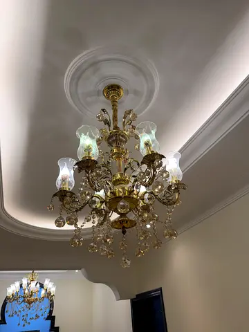 Antique-style crystal chandelier in brass finish - good condition asking 200 each