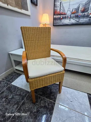 Wicker rattan dining/armchair with cushioned seat - gently used
