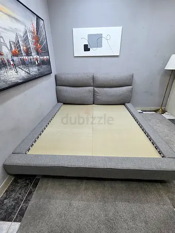 Grey upholstered /king bed frame with headboard (no mattress)