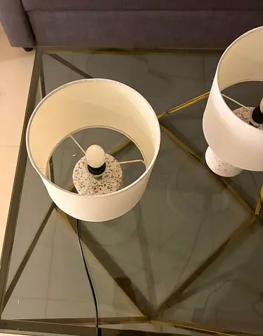 Pair of modern table lamps with white shades and gold bases