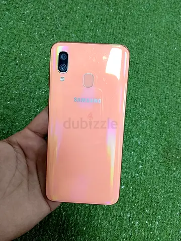 Samsung Galaxy (peach) with dual camera — good working condition