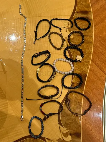 Collection of men's and unisex bracelets — leather, beads and chain (pre-owned)