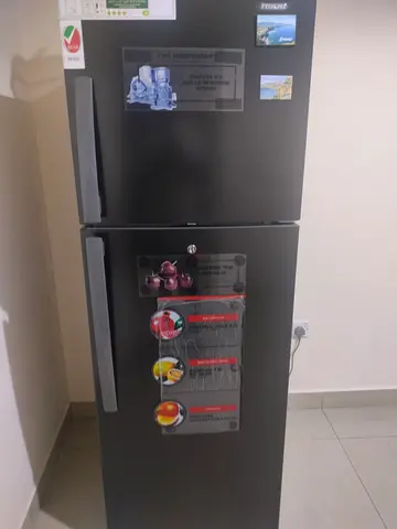 Black double-door refrigerator - good working condition