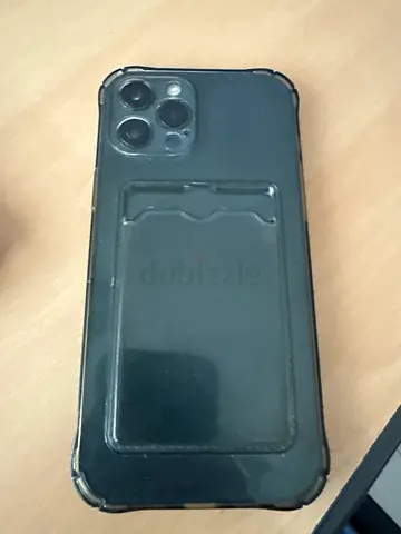 iPhone (Pro) with protective case and card holder - good condition