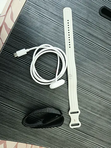 Fit it air brand new with cable and extra one silicone strap