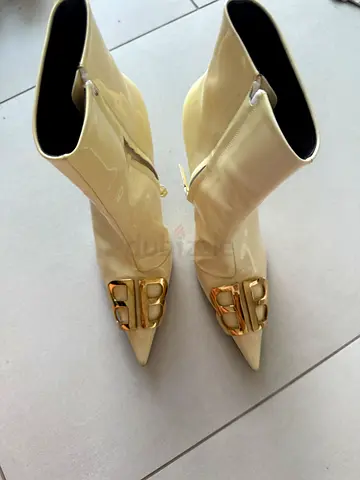 BALENCIAGA authentic Cream patent leather pointed ankle boots with gold logo detail