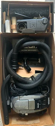 Compact canister vacuum cleaner with accessories - good working condition