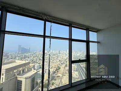 Commercial property with 2 floors and a rooftop on Sheikh Khalifa Street, featuring an open view of Ajman and Sharjah. Ideal for cafés, restaurants, a