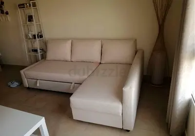 Beige L-shaped Sofa bed with Chaise - Good Condition