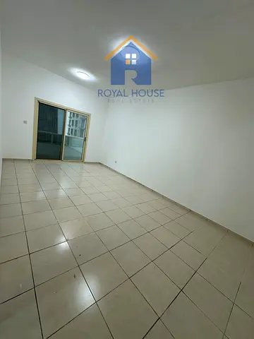 For sale: two bedrooms and a living room near Al Taawon, close to Dubai exit. Very good location for living or investment, with a parking space.