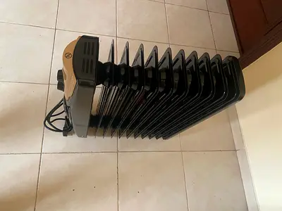Black & Decker Portable Oil-Filled Radiator Heater - 11 Fins, Good Working Condition
