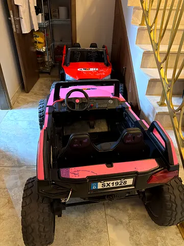 Kids rechargeable 2-seater off-road ride-on car (pink), lightly used
