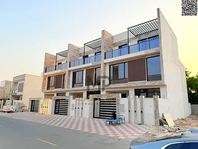 Townhouse for sale in Ajman | Al Helio 2 area | 4 bedrooms, majlis, living room, and roof terrace | Freehold ownership for all nationalities | Price i