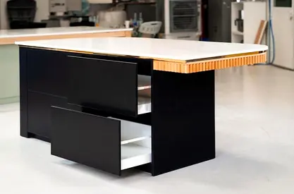 Premium and modern kitchen island with storage drawers and high quality heavy stone countertop.