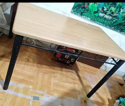 Simple wood-top study table with metal legs — good condition