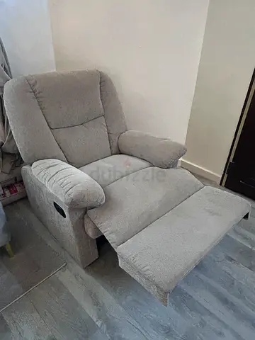 Light grey single reclining armchair - good condition