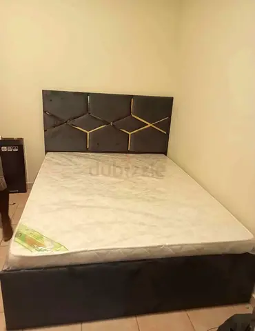 Queen size upholstered bed with mattress - good condition