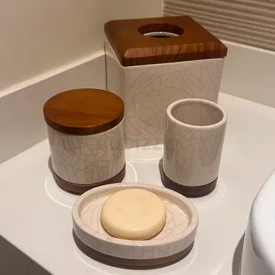 6 piece ceramic bathroom accessory set with wooden accents (tissue holder, soap dish, tumbler, jar)