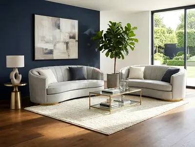 Pair of curved light grey sofas — modern 2-seater lounge set