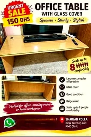 OFFICE TABLE WITH GLASS COVER FOR URGENT SALE-150 DHS AT SHARJAH ROLLA NEAR BUSSTAND AND NMC CLINIC