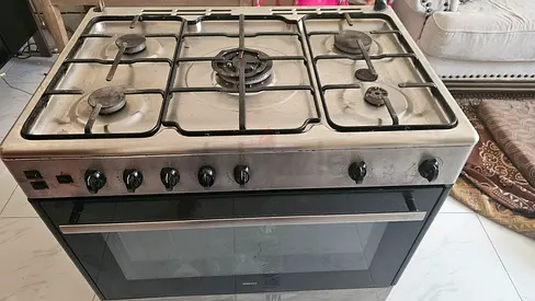 Used freestanding 5-burner gas  cooker with oven (stainless steel) ajman