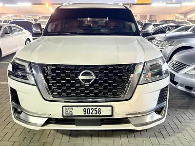 2015 Nissan Patrol LE Platinum GCC Specs FULL OPTION BLACK COLOR PUT STICKER WHITE VERY CLEAN CAR