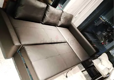 Black leather  sofa bed  good condition